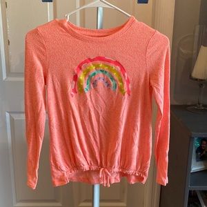 Peach long sleeve shirt with rainbow wiener dogs